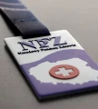 Prostokątny metalowy medal z nadrukiem standard plus - medal lakierowany2.webp
