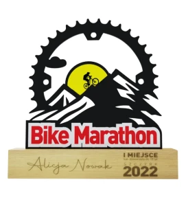 Statuetka z metalu rowerowy maraton na drewnianym postumencie