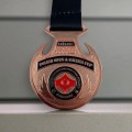 Medal odlewany custom karate BRĄZOWY PRZÓD.jpg